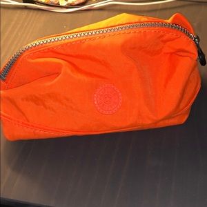 Brand new orange Kipling cosmetic bag